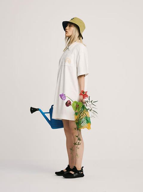ニューバランスの「NB Essentials Bloomy ドレス」の着用画像